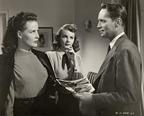 Carter, Janet Blair and Franchot Tone in I Love Trouble (1948)