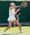 Katie Swan competing in the first round of the 2015 Wimbledon Qualifying Tournament at the Bank of England Sports Grounds in Roehampton, England. The winners of three rounds of competition qualify for the main draw of Wimbledon the following week.