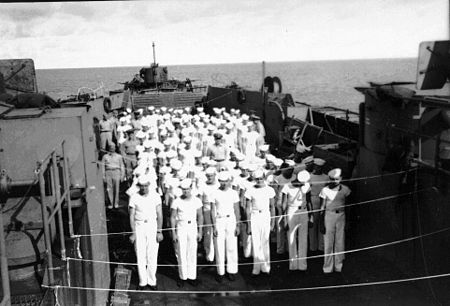 LST-504 standing at inspection, between Guam and Saipan, date unknown. LST-504 standing at inspection.jpg
