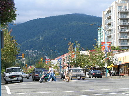 Main thoroughfare Lonsdale Avenue with Mount Fromme in the background