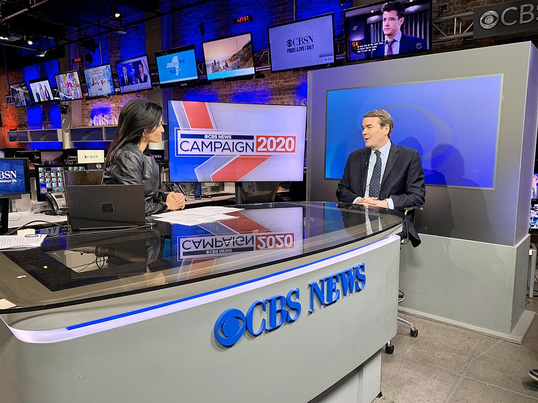 File:Michael Bennet with Reena Ninan on CBS.jpg