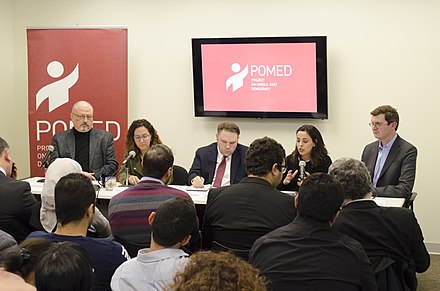 Saudi Arabian dissident journalist Jamal Khashoggi (left) at a 2018 Project on Middle East Democracy forum in Washington, D.C.
