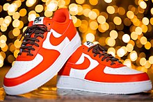 A pair of Air Force 1s in Cleveland Browns colors Nike Air Force 1 Browns.jpg