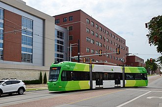 The 2018-opened Oklahoma City Streetcar system serves the hospital. OKC streetcar turning from Dewey Ave onto 10th St next to St Anthony Hospital (2021).jpg