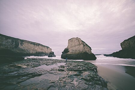 "Ocean_bay_rocks_(Unsplash).jpg" by User:Fæ