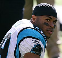 Steve Smith played wide receiver for the Panthers from 2001 to 2013. In 2005, Smith led the NFL in receptions, receiving yards, and touchdowns. Panthers WR Steve Smith sits.jpg