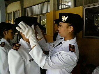 Female version of peci with curved back, worn by Indonesian flag raising girls squad (Paskibra)