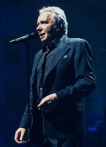 Michel Sardou at the Palais des Sports in 2005. Pds053cut.jpg