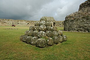 Catapult or trebuchet ammunition at Pevensey Castle Pevensey Castle catapult balls.jpg