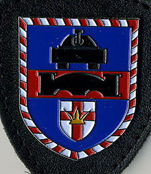 Symbolische Darstellung auf dem Verbandsabzeichen der PzPiSperrKp 741
