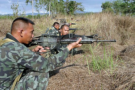 Philippine marines using M16A1 rifles with the A2 style handguard during a military exercise