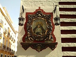 Azulejo image of the Soledad at the Church's facade.