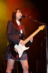 Lead vocalist Haruna performing at Japan Expo 2008 in France.