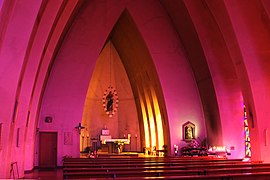 Schwanenkirche Roes, interior in the light of the stained glass windows