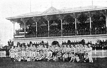 The Bloods and the touring British Lions in front of the grandstand at the South Melbourne Cricket Ground in 1888. South Melbourne won 7 goals to 3.