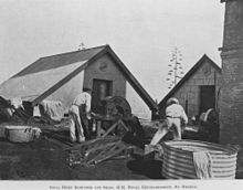 Prisoners making fibres from flax to turn into rope, 1911