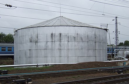 Historical oil tank using steel rivets to attach wall metal plates