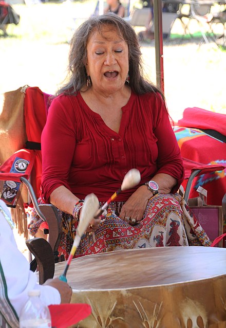 Mildred "Midge" Wagner, a Lakota woman, singing at a pow wow in 2015.
