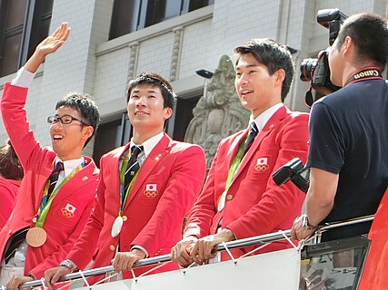 2016 Rio de Janeiro Olympic and Paralympic Games Parade of Japan National Team on 7th October, 2016. Located in Nihonbashi, Chuo-ku, Tokyo, Japan. From left to right: Hirooki Arai, Yoshihide Kiryu and Shota Iizuka.