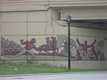 Mural of Glover, on the I-43 overpass in Milwaukee, showing his escape from prison and slavery. The escape of Joshua Glover.jpg