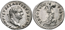 Roman denarius depicting Titus, c. 79. The reverse commemorates his triumph in the Judaean wars, representing a captive kneeling in front of a trophy of arms. Titus Augustus Denarius.png