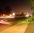 The traffic on this street leaves brilliant streaks due to the low shutter speed of the camera and the cars' relatively fast speed.