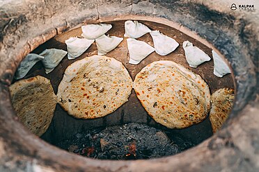 Turkmen bread baking in tandyr