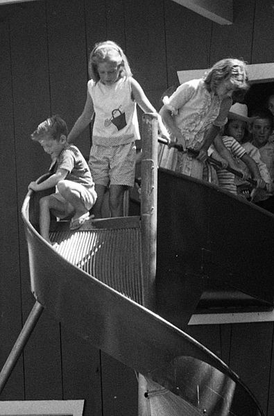 File:Two children preparing to use a curving playground slide, 1963.jpg