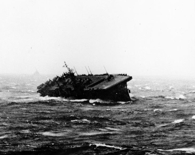 Langley rolling heavily to starboard during Typhoon Cobra, 18 December 1944. Taken from USS Essex.