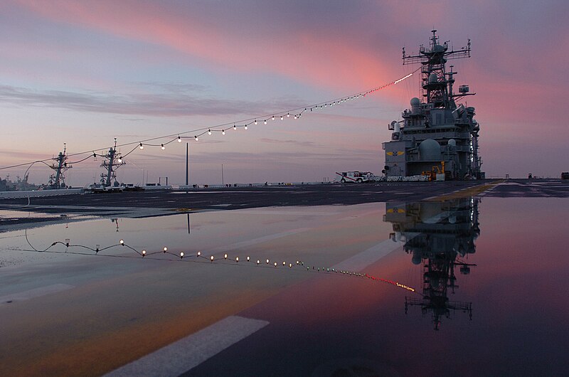 File:US Navy 060101-N-9866B-363 The amphibious assault ship USS Peleliu (LHA 5) home ported at Naval Station San Diego displays her holiday lights in celebration during the first morning sunrise of the New Year.jpg