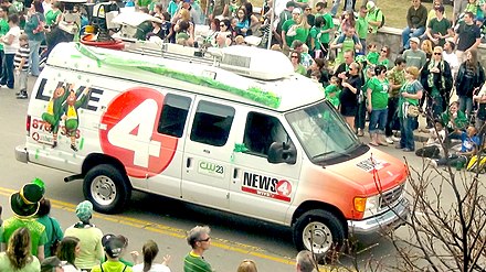 A WIVB-TV truck driving through the streets of the 2012 St. Patrick's Day parade in Buffalo, New York.