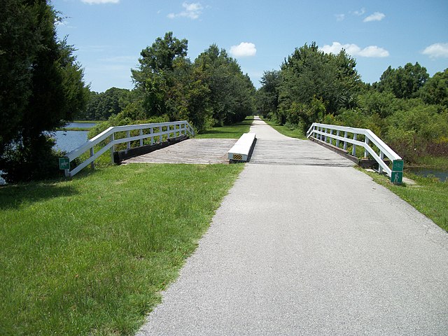 The Withlacoochee State Trail crosses an old railroad bridge over part of Henderson Lake.