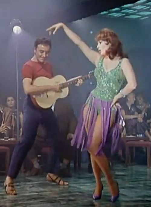 Loren in It Started in Naples (1959), in which she sang "Tu Vuò Fà L'Americano"