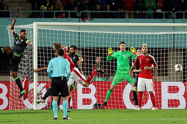 Hennessey (in light green) in goal for Wales against Austria in October 2016