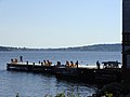 Riverport Looks On As The Pier Pierces Waves