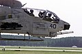 A United States Marine Corps AH-1W Super Cobra attack helicopter hovers above the Shaw Air Force Base, South Carolina, flight line as it positions itself in a hot pit refueling area - DPLA - 3445f5fc0b8b7ae6a853c4c3b813dc86.jpeg