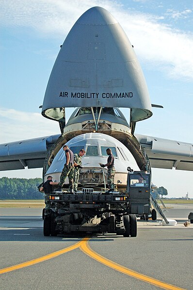 File:Airman from the 436th Aerial Port Squadron and 9th Airlift Squadronload a C-5 Galaxy flight deck on a C-5 for transport to Robins AFB.jpg
