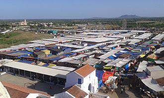 Annual Mota Yaksh fair at foothills of Kakadbhit Annual Mota Yaksh Fair at Jakh Botera (Kutch folk deities) temple at Kakadbhit, Kutch, Gujarat, India.jpg