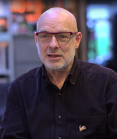 Brian Eno influenced Coldplay's ambient and electronica sound Brian Eno 2015.png