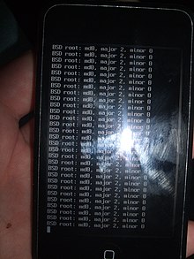 A soft bricked iPod Touch, displaying only error messages as BSD root. Bricked iPod (2324879931).jpg