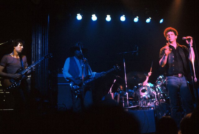 Reed performing onstage with guitarist Chuck Hammer, June 1979, The Bottom Line, New York City