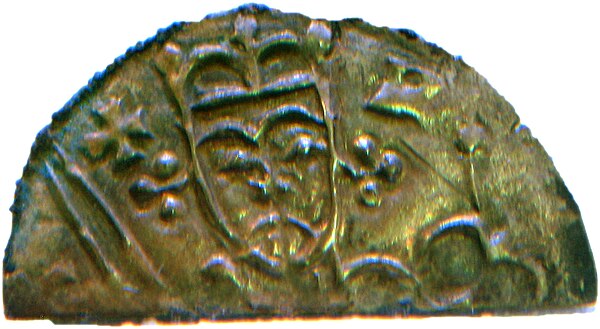 Fragment of a coin depicting King Niels