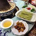 Condiments and sauces for Shuanrou (instant-boiled mutton), along with picked garlic and green bean noodles