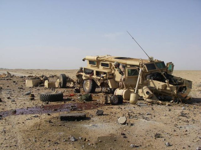 A U.S. Cougar which was struck by an approximately 90–136 kg (198–300 lb) directed charge IED during the Anbar campaign. The crew of the MRAP survived