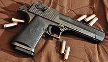 Photo of the: gun in the——white background.