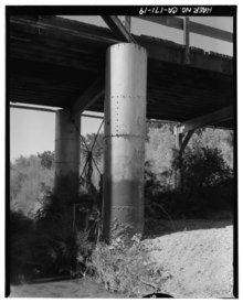 A Lally column at the northwest end of truss of the Red Bank Creek Bridge at Rawson Road, Red Bluff, Tehama Detail, lally columns at northwest end of truss. View to southwest from downstream side. - Red Bank Creek Bridge, Spanning Red Bank Creek at Rawson Road, Red Bluff, Tehama HAER CAL,52-REBLU.V,2-19.tif