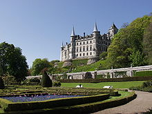 Dunrobin Castle has similar architecture and partly exposed semi-green foundations as some medieval French castles such as Josselin Castle but is of the pan-19th century Scottish Baronial architecture with a formal french garden and is the seat of the Earls or Countesses of Sutherland - a title which passes to eldest female heirs on lack of male heirs. Dunrobin Castle.JPG