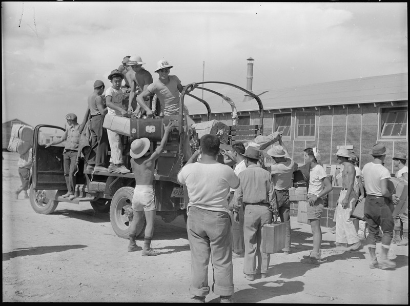 File:Eden, Idaho. Baggage, belonging to evacuees from the assembly center at Puyallup, Washington, is so . . . - NARA - 538280.tif