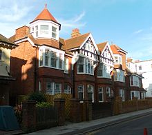 The west side of Denmark Terrace (Vernon Gardens) has some early 20th-century red-brick houses. Edwardian Houses on Denmark Terrace, Brighton.JPG