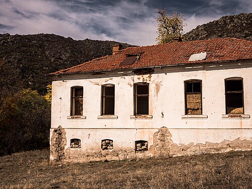 Abandoned and repurposed school building in Dabnica, North Macedonia